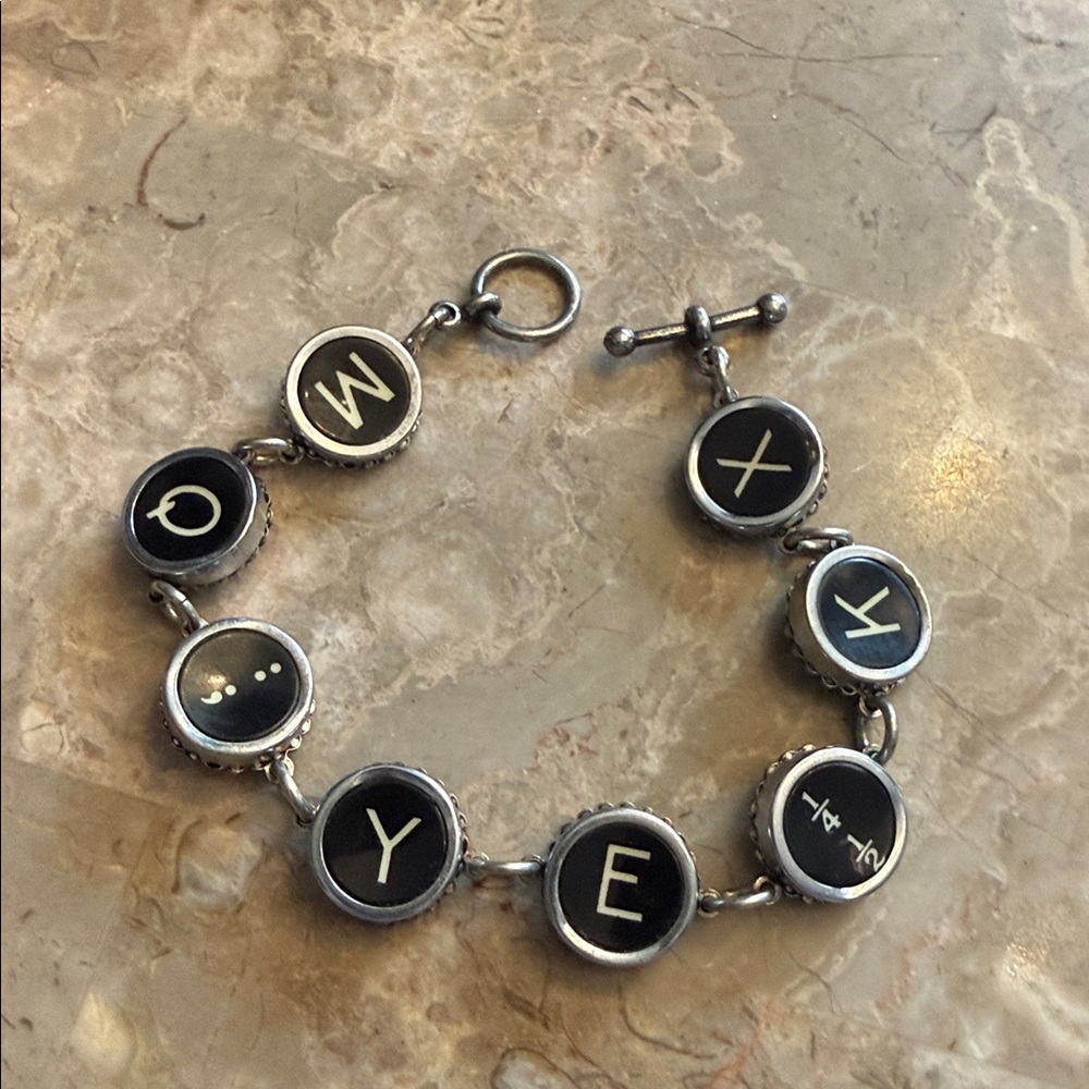 Unique typewriter key bracelet, silver, and black tone with toggle closure